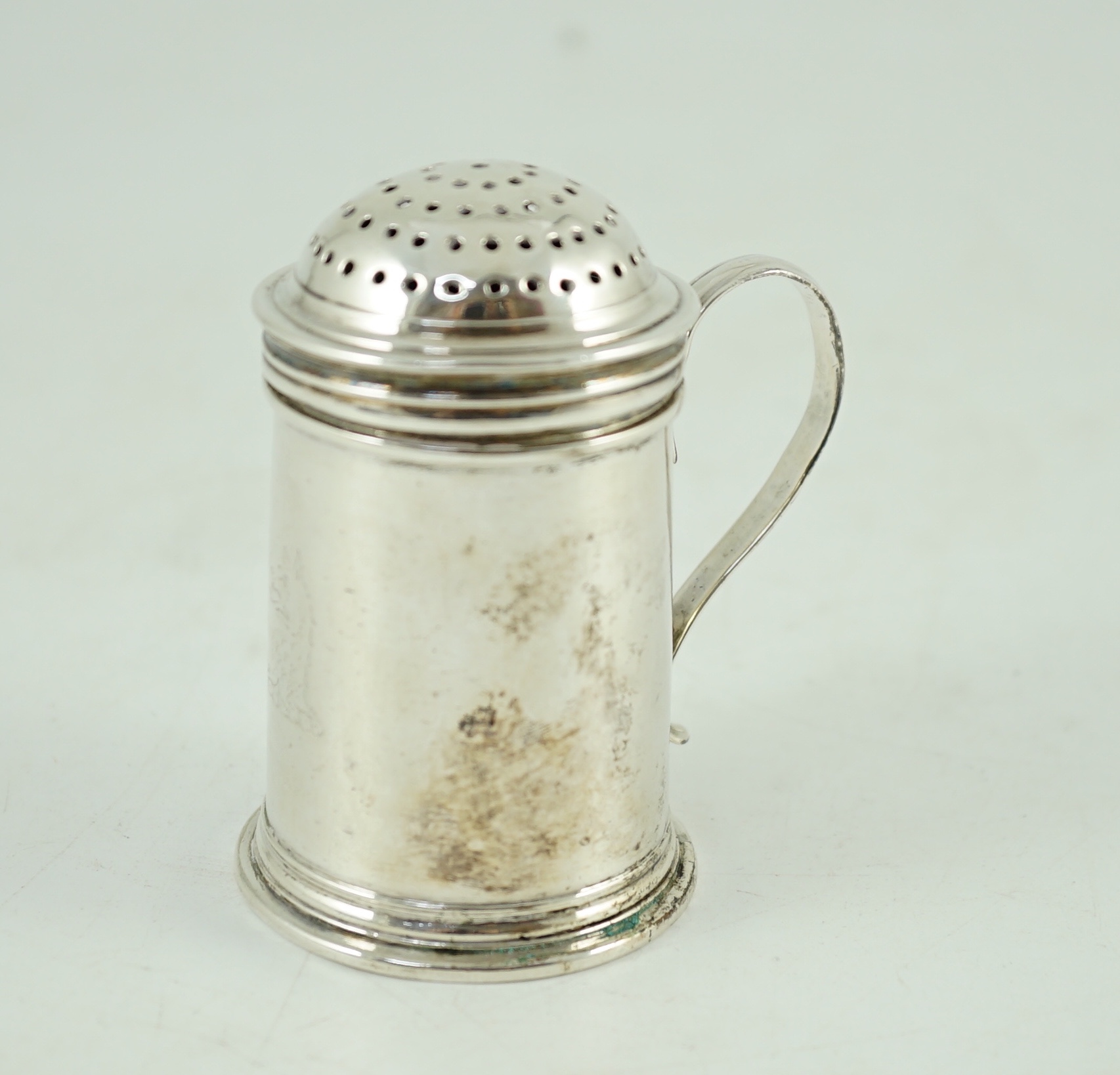 An early George I silver kitchen pepper, no maker's mark